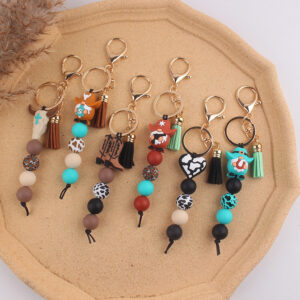 oly-fc4a8653355c8ee3ae5112149fe6b1d2 Wholesale Western Cowboy Silicone Tassel Keychain Bag Charm Fashion Accessory