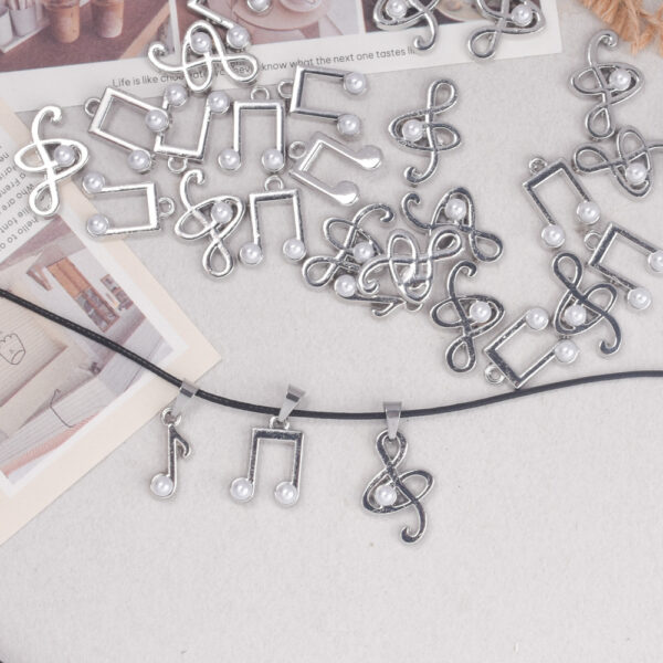 oly-fd87d4ec959933ab3944f4abe24d69e2 Wholesale Zinc Alloy Electroplated White Music Note Pendant DIY Keychain Accessory Fashion Craft Supply