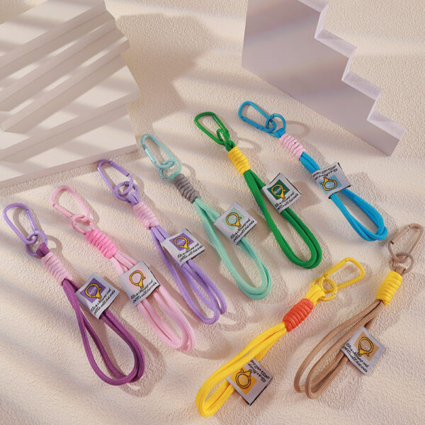 oly-fdff06b7f70503497bd0491644dcfefe Wholesale Polyester Braided Wrist Strap Lanyard with Star Pattern Colorful Knots for Keys Phone Decorative Accessory