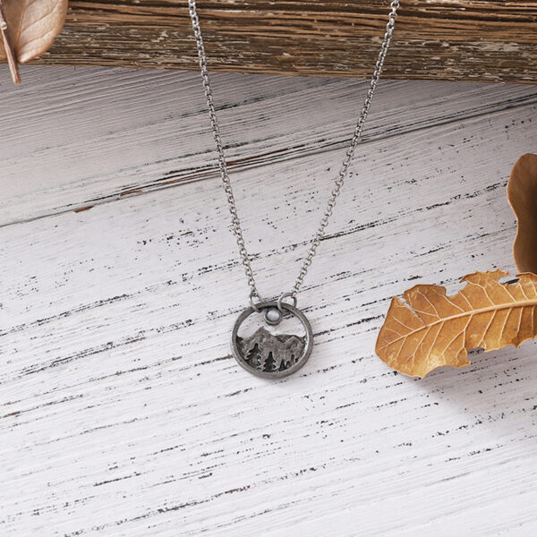 oly-01f4355da54f5d50a87a1efcf48f04d5 Wholesale Retro Bohemian Round Openwork Turquoise Mountain Pendant Necklace Antique Silver Finish Gift