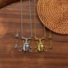 oly-02c39f0363719d2f85f126d8115ca8f9 Wholesale Vintage Bohemian Style Beetle Earring Necklace Set Zinc Alloy Jewelry With Gold Plating Fashion Accessory For Party Or Gift