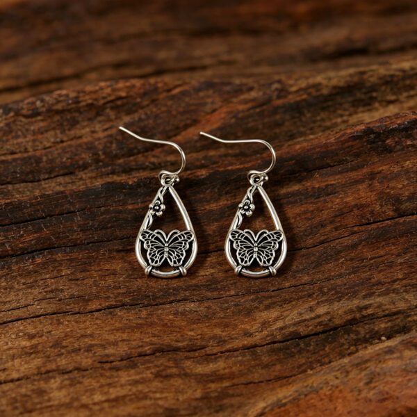 oly-087c4ac11b024566b1cb31b9dace0ac0 Wholesale Retro Ethnic Butterfly Flower Hollow Teardrop Earrings Alloy Women S Fashion Accessory Party Gift