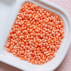 05-orange / Size is about 4*6.5mm, hole diameter is about 1.2mm