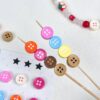 oly-0faef392ada65274aa036e52c21e3983 Wholesale Cute Button Pattern Acrylic Beads for DIY Necklace Bracelet Phone Chain Making