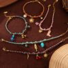 oly-116acc8d28f16d6adafa0cd4da723f36 Wholesale Woven Rope Charm Bracelet Titanium Steel With Sun Cherry Flower Fish Boot Pendants Fashion Accessory For Gift Or Boutique Resale