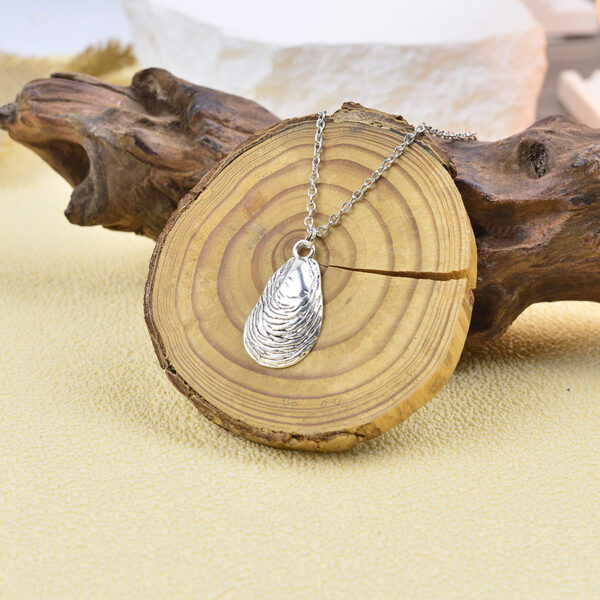 oly-16719b608c04ec90bbc6ca6d25331349 Wholesale Retro Metal Shell Pendant Necklace And Earrings Set Beach Vacation Style Fashion Jewelry Accessory For Gift And Resale