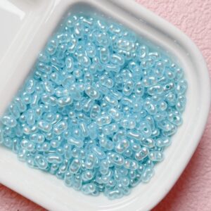 E29-02-light blue / The size is about 4*6.5mm, the aperture is about 1.2mm
