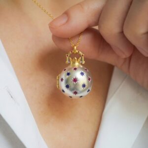 Silver pomegranate opening and closing pendant (gold chain)