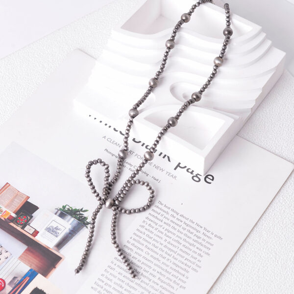 oly-1b945e0e3aa5f59961a86ac142b49b40 Wholesale Bronze Electroplated Zinc Alloy Beaded Bow Choker Necklace Retro Denim Style Fashion Accessory