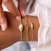 oly-1d1bbe9443a8b9948efcfc9d4c2df125 Wholesale Chic Seaside Vacation Bracelet Stainless Steel Woven Rope Conch Design Jewelry Accessory For Resale