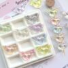 oly-1d6f889e3fd4f62bbfe8f832cced9d3c Wholesale UV Plated Transparent Angel Heart Acrylic Beads for DIY Phone Charms Keychains Boutique Resale