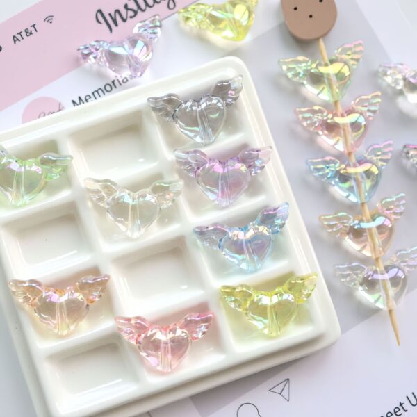 oly-1d6f889e3fd4f62bbfe8f832cced9d3c Wholesale UV Plated Transparent Angel Heart Acrylic Beads for DIY Phone Charms Keychains Boutique Resale