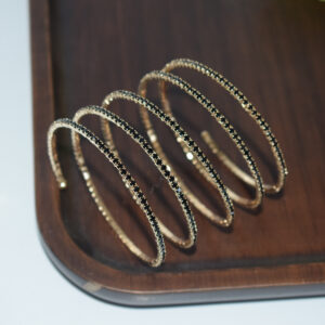 5 rows of golden black diamonds