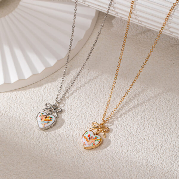 Wholesale Vintage Angel Heart Locket Necklace With Electroplating Copper Bow And Copper Clavicle Chain Gift Boutique Jewelry