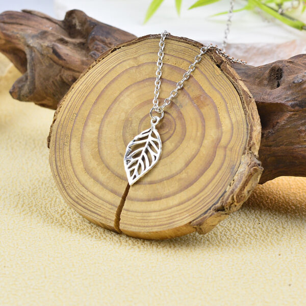 oly-2b65623d30df66e173995fd57f4d1e6a Wholesale Plated Zinc Alloy Leaf Pendant Earrings And Necklace Set Korean Minimalist Hollow Out Style Fashion Jewelry For Women