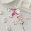 oly-34382df62f451f230ba46dbf73841ee2 Wholesale Cute Puppy Fish Bowknot Alloy Beads for DIY Phone Chain and Bracelet Making Fashion Accessory