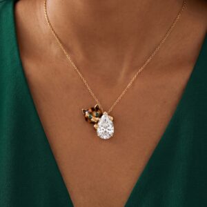 Black-faced cat teardrop necklace