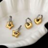 oly-3e490696ed8bb86216c9b5d7fe7eb4e3 Wholesale Titanium Steel Electroplated Lucky Star Earrings French Contrast Color Oval Ear Cuffs Fashion Jewelry For Women