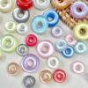 oly-446e0c2badb7deffd577d05243d37014 Wholesale Resin Cat Eye Donut Loose Beads Double-Sided Starry Light Changing for DIY Jewelry Making Phone Charm Bag Accessory