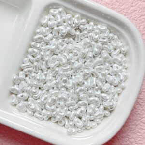 01-white / Size is about 4*6.5mm, hole diameter is about 1.2mm