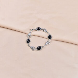 Black gemstone stitched claw bracelet