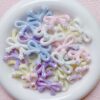 oly-47a2c28ee813e82bafc3a1ed09716bd9 Wholesale Modern Electroplated Star and Bow Acrylic Loose Beads for DIY Phone Charm Keychain Jewelry Making