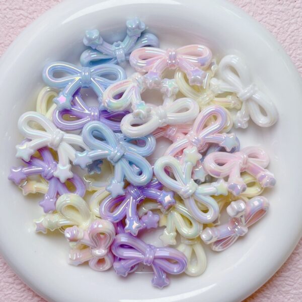oly-47a2c28ee813e82bafc3a1ed09716bd9 Wholesale Modern Electroplated Star and Bow Acrylic Loose Beads for DIY Phone Charm Keychain Jewelry Making