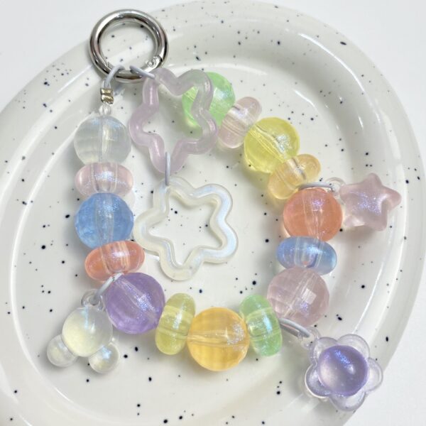 oly-4d1eee5976ded2326ce5480b20ae8948 Wholesale Stylish Acrylic Glow-in-the-Dark Hollow Star Beads for DIY Phone Strap, Keychain, Pendant Jewelry Making Craft Supply