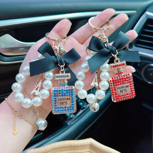 Wholesale Trendy Rhinestone Bow Perfume Bottle Keychain Pearl Chain Bag Charm For Women Wedding Gift Car Key Accessory
