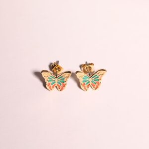 A pair of small green earrings