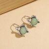 Wholesale Retro Bohemian Oval Green Synthetic Gemstone Pendant Earrings Silver Tone For Party Wear Fashion Accessory