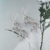 oly-4efe0afd45a736a4ca9fcf2a384de95c Wholesale Trendy Simple Unicorn Skeleton Earrings And Necklace Set Ancient Silver Zinc Alloy Hollow Design Fashion Jewelry Accessory For Resale