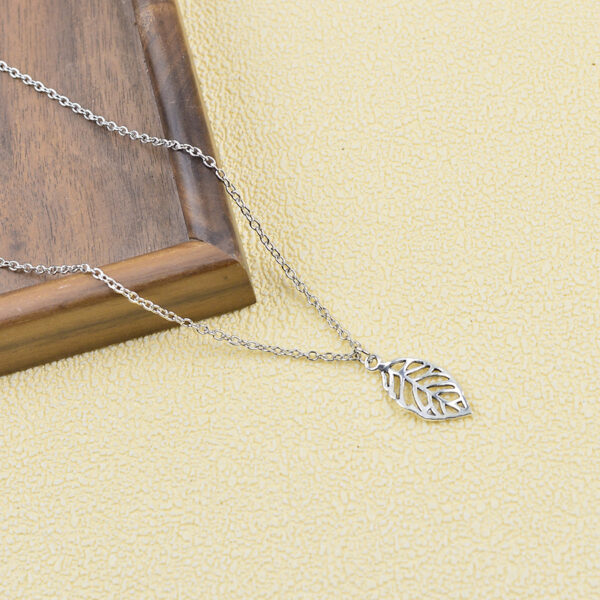 oly-50f74348a8c7e1fdeff9e2e7d2b78fc5 Wholesale Plated Zinc Alloy Leaf Pendant Earrings And Necklace Set Korean Minimalist Hollow Out Style Fashion Jewelry For Women