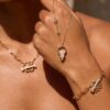 oly-5a49a2db3227a465013bc327f5ead64f Wholesale Paw Print Bone Copper Necklace Electroplated Trendy Jewelry Accessory For Boutique Resale