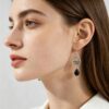 oly-5d56e97751451a1b93e9d240a41d7c0a Wholesale Vintage Hollow Butterfly Flower Earrings For Women Black Teardrop Zircon Antique Finish Party Wear