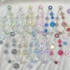 oly-5dce31af8a0241c66813015f10f996a9 Wholesale Resin Cat Eye Donut Loose Beads Double-Sided Starry Light Changing for DIY Jewelry Making Phone Charm Bag Accessory