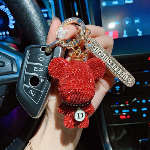 oly-5de48461e50e60a762a3751150caac2d Wholesale Metal White AB Rhinestone Crown Bear Car Keychain With Number Plate Couple Gift