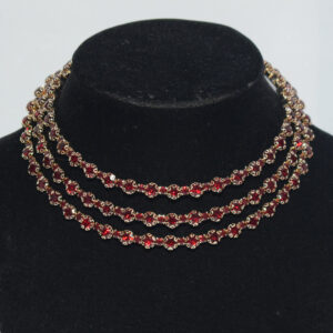 3 rows of golden dark red diamonds