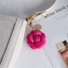 oly-60a9b33851fa2c4023803575b6b96aa0 Wholesale Leather Camellia Flower Keychain Cute Bag Charm Car Key Accessory Stylish Gift For Women