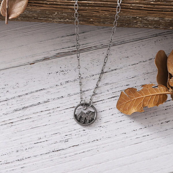 oly-67a8ebb9ccb05b801ebbb63393aed13f Wholesale Antique Silver Zinc Alloy Mountain Pine Tree Hollow Pendant Necklace Trendy Jewelry Gift For Women
