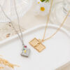 oly-69f4abbc29faced1875693c2903937f3 Wholesale Vintage Star Moon Book Pendant Necklace Electroplating Copper Copper Openable Locket Silver Boutique Resale