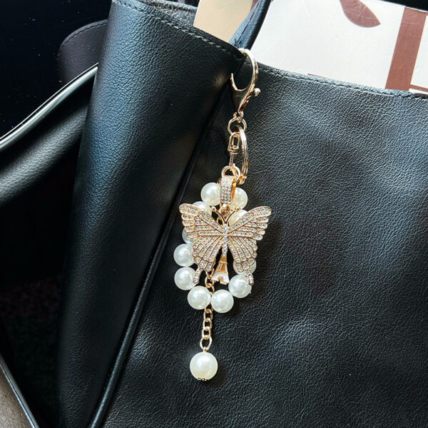 oly-6a4b4c730a63a4768f9634d336600b80 Wholesale Butterfly Pearl Keychain Gold Alloy Women S Fashion Accessory For Car And Bag Boutique Resale