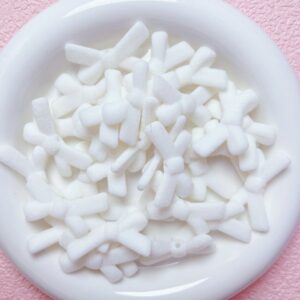 06-white / Size is about 34*18mm, hole diameter is about 1.9mm
