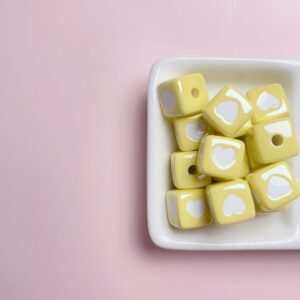 18-Baked White Yellow Love / Size about 12*12mm, aperture about 3mm