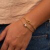 oly-6e24f0595d68dd1050067c752e6f80de Wholesale Chic Seaside Vacation Bracelet Stainless Steel Woven Rope Conch Design Jewelry Accessory For Resale