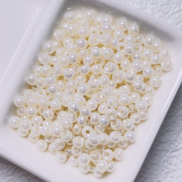 oly-6f570f782460ba8ff6588a14282c98d4 Wholesale Cream Iridescent Acrylic Rice Beads 4mm 200pcs for DIY Jewelry Making Fashion Gift