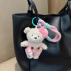 oly-778ab35083f9bfb3b5499aaf507a6512 Wholesale Plush Bear Keychain Bag Charm Cute Pink Overalls Pendant Fashion Accessory Gift For Women