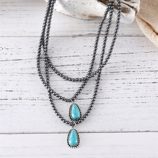 oly-7d4e59bd3f2db1e4cae6c519d27d2239 Wholesale Bohemian Ethnic Teardrop Turquoise And Black Beaded Necklace Ancient Silver Ball Chain Fashion Jewelry Accessory For Boutique Resale