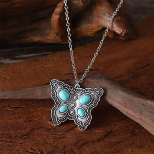Round turquoise butterfly