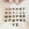 oly-84e4f77ec07c758567558b3789f9a7d6 Wholesale Mirror Silver Plated Acrylic Letter Beads Large Hole DIY Phone Charm Bag Pendant Jewelry Making Craft Supply